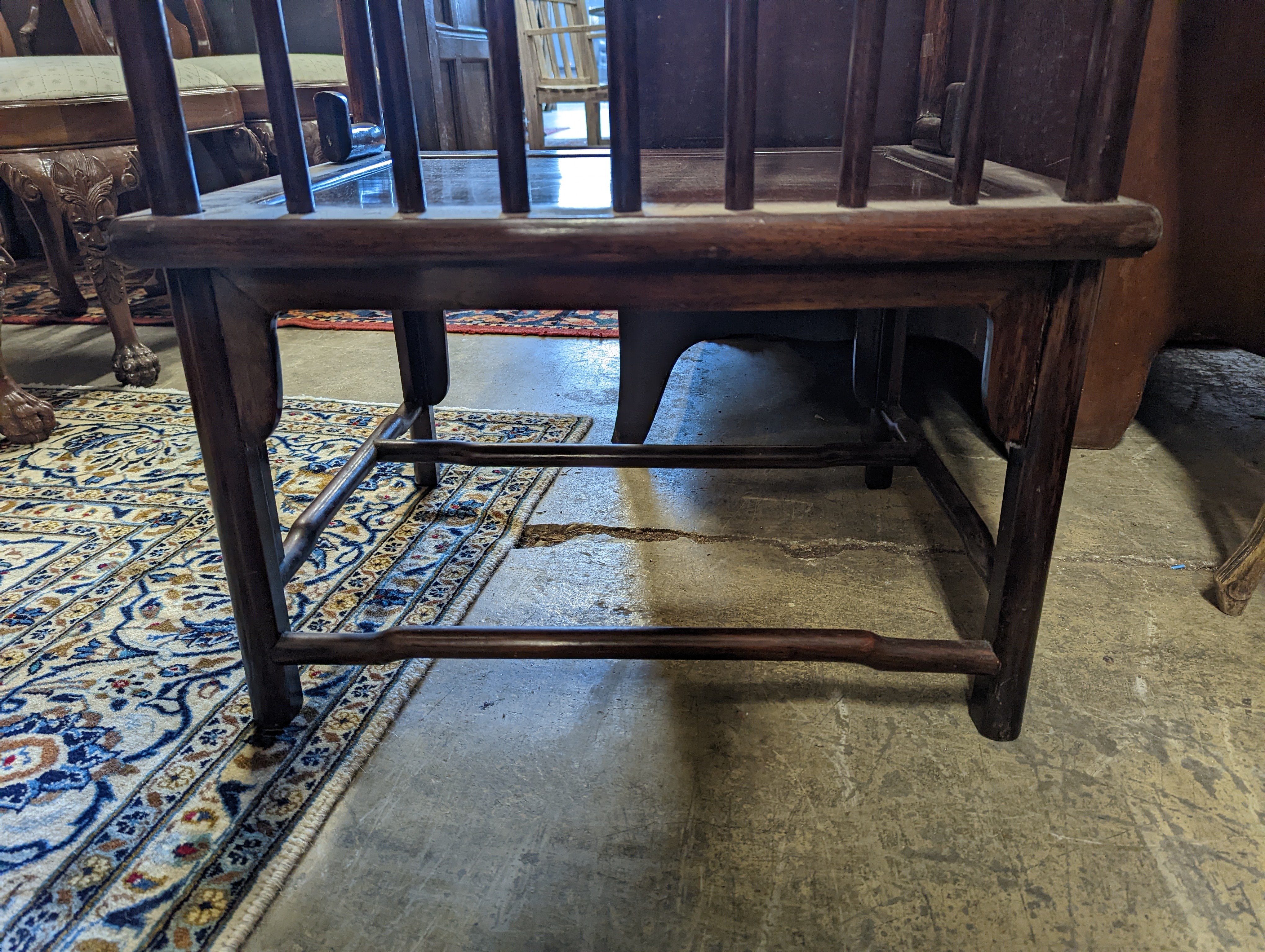 A pair of mid 20th century Chinese Hongmu elbow chairs with cushion seats, width 58cm, depth 49cm, height 92cm